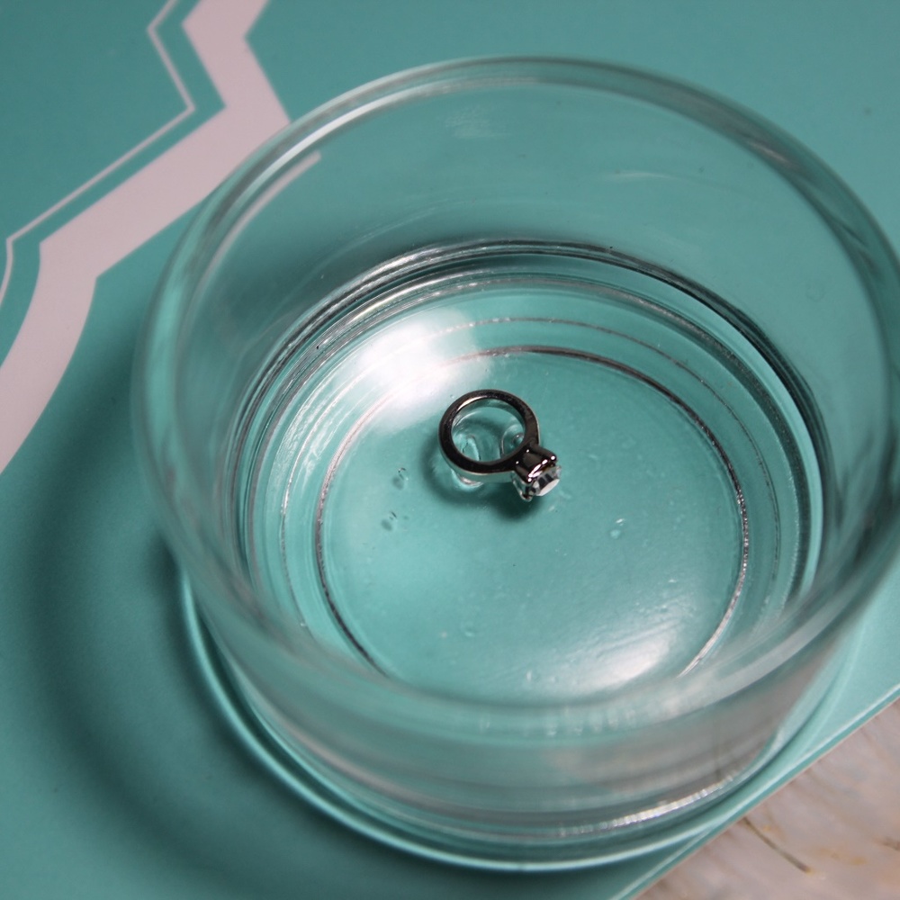 Silver floating ring charm